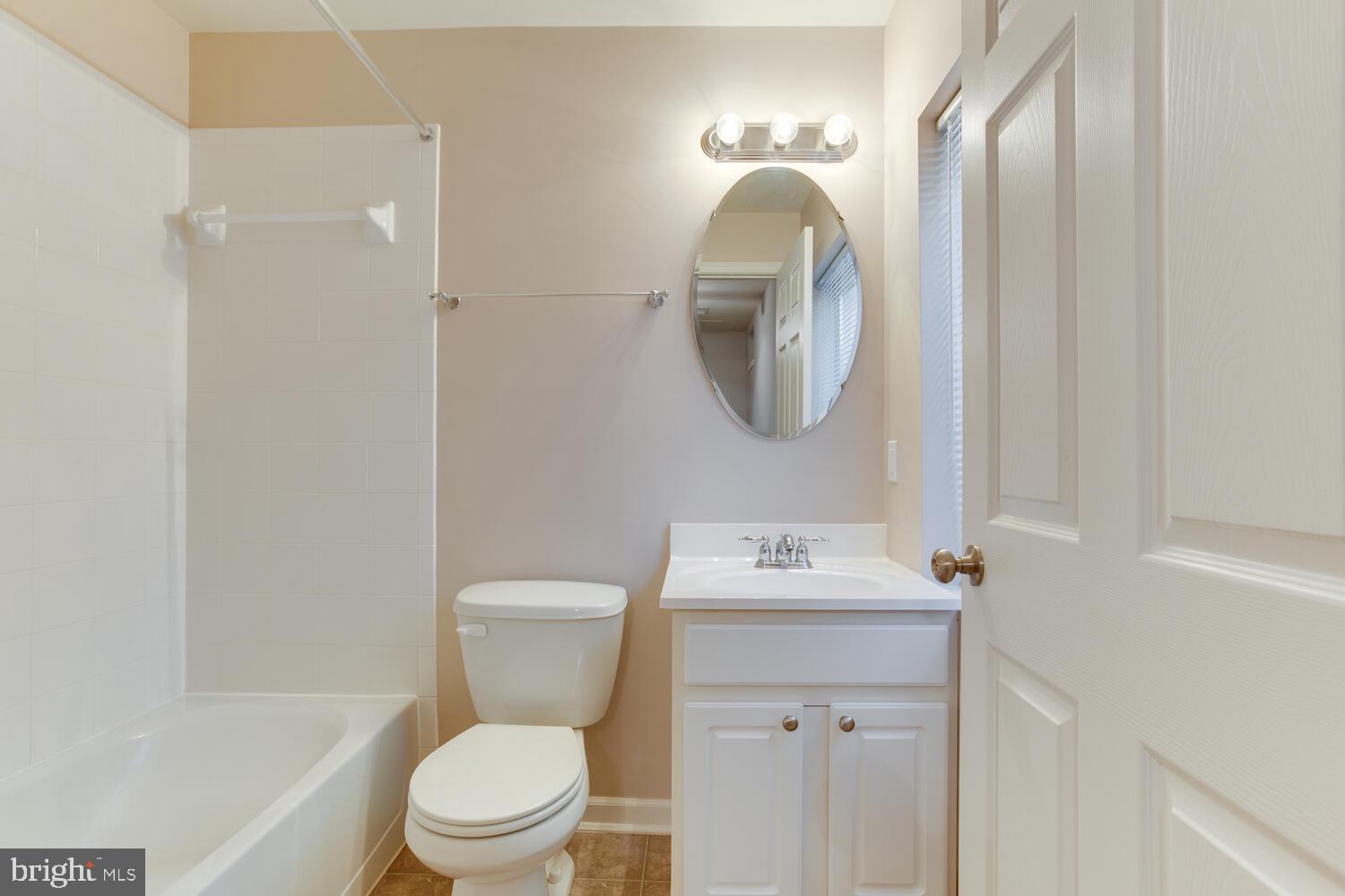 2303 Forest Ridge Terrace, Unit E Chesapeake Beach, MD 20732 - Photo 12 of 73 Main level full bath
