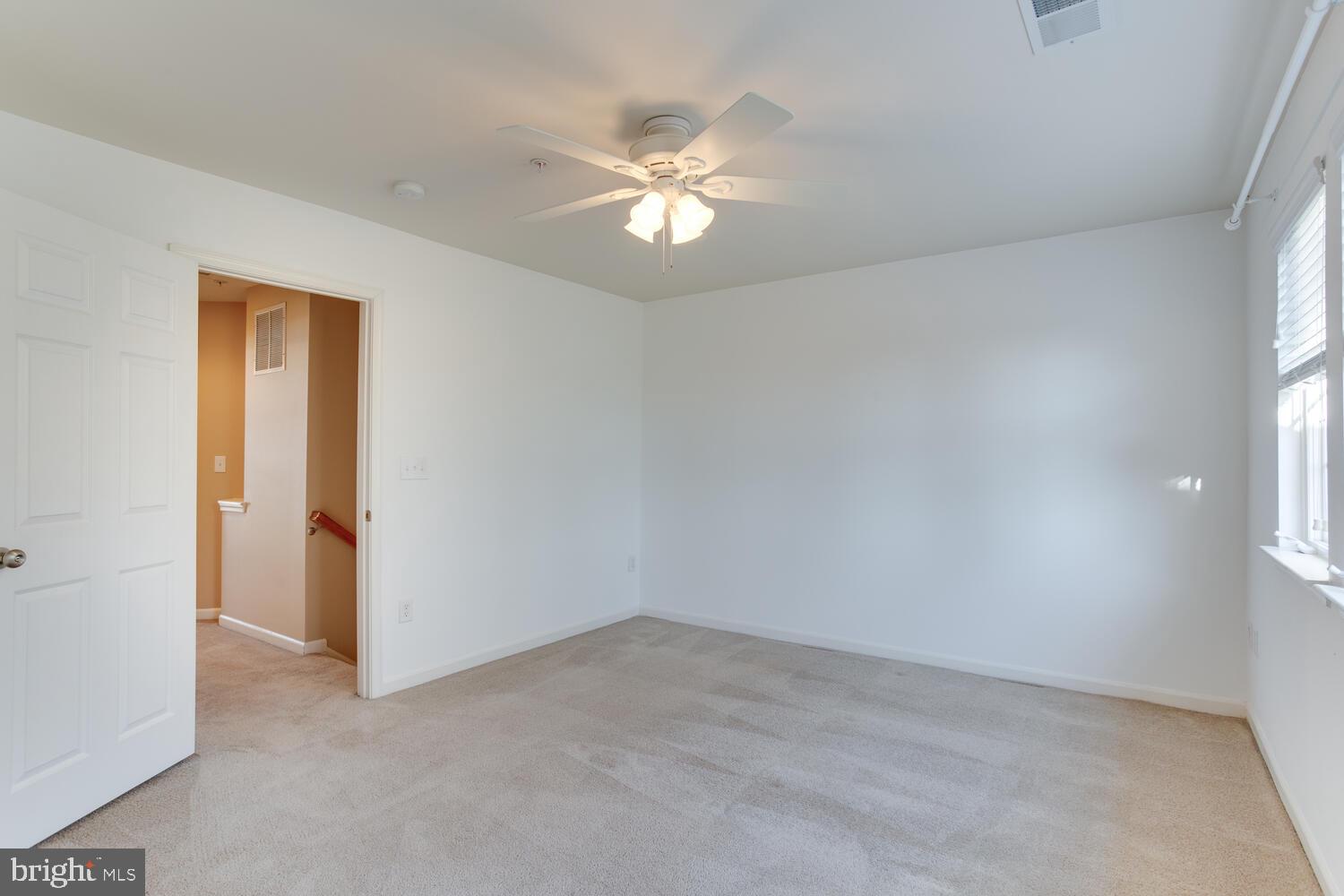 2303 Forest Ridge Terrace, Unit E Chesapeake Beach, MD 20732 - Photo 27 of 73 Primary Bedroom