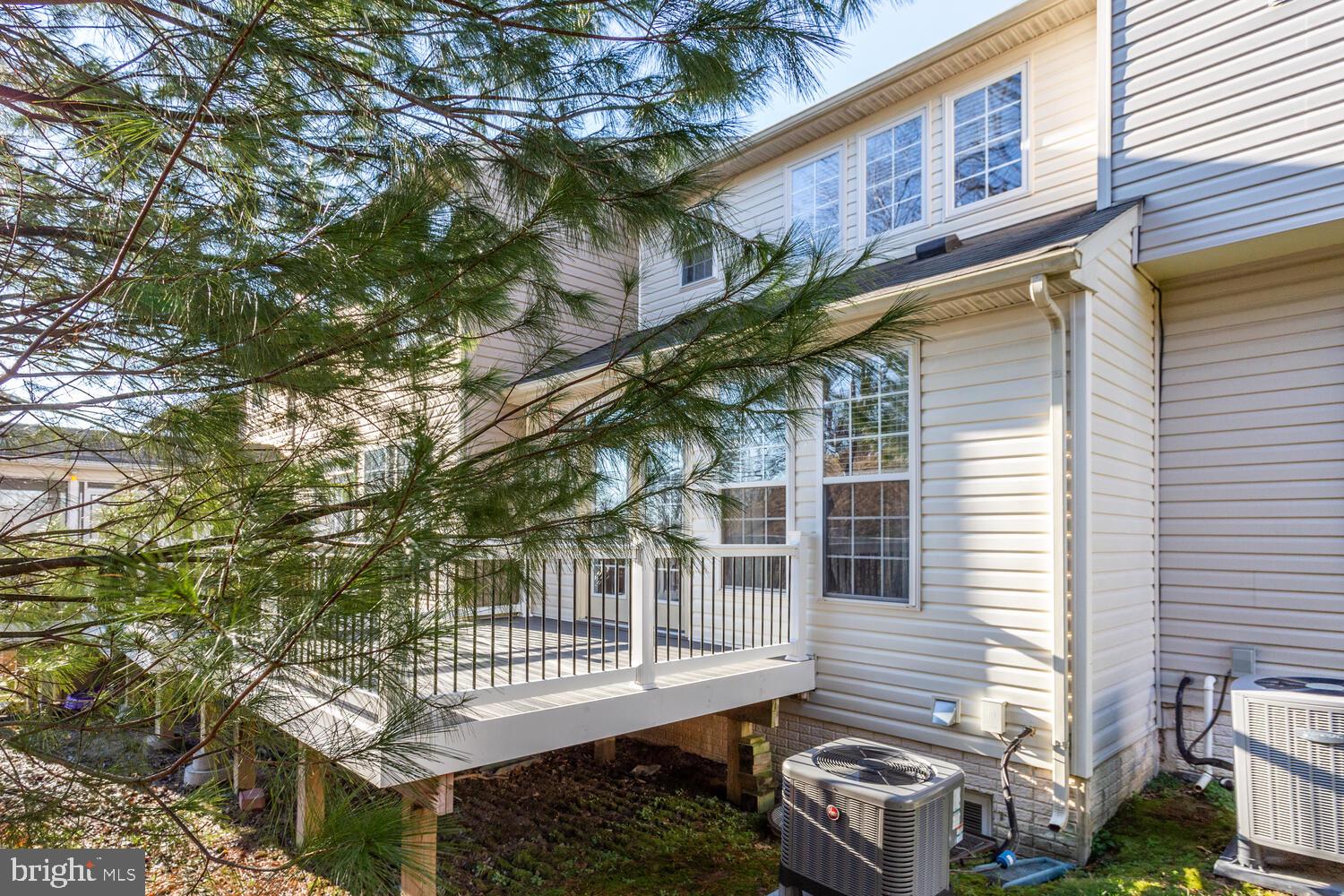 2303 Forest Ridge Terrace, Unit E Chesapeake Beach, MD 20732 - Photo 42 of 73 Deck and back of home