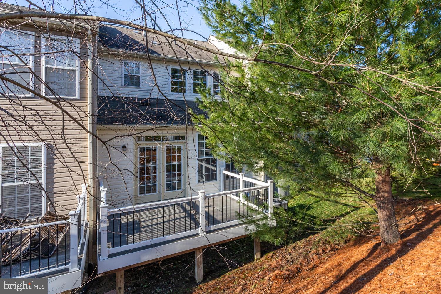 2303 Forest Ridge Terrace, Unit E Chesapeake Beach, MD 20732 - Photo 43 of 73 Beck and back of home