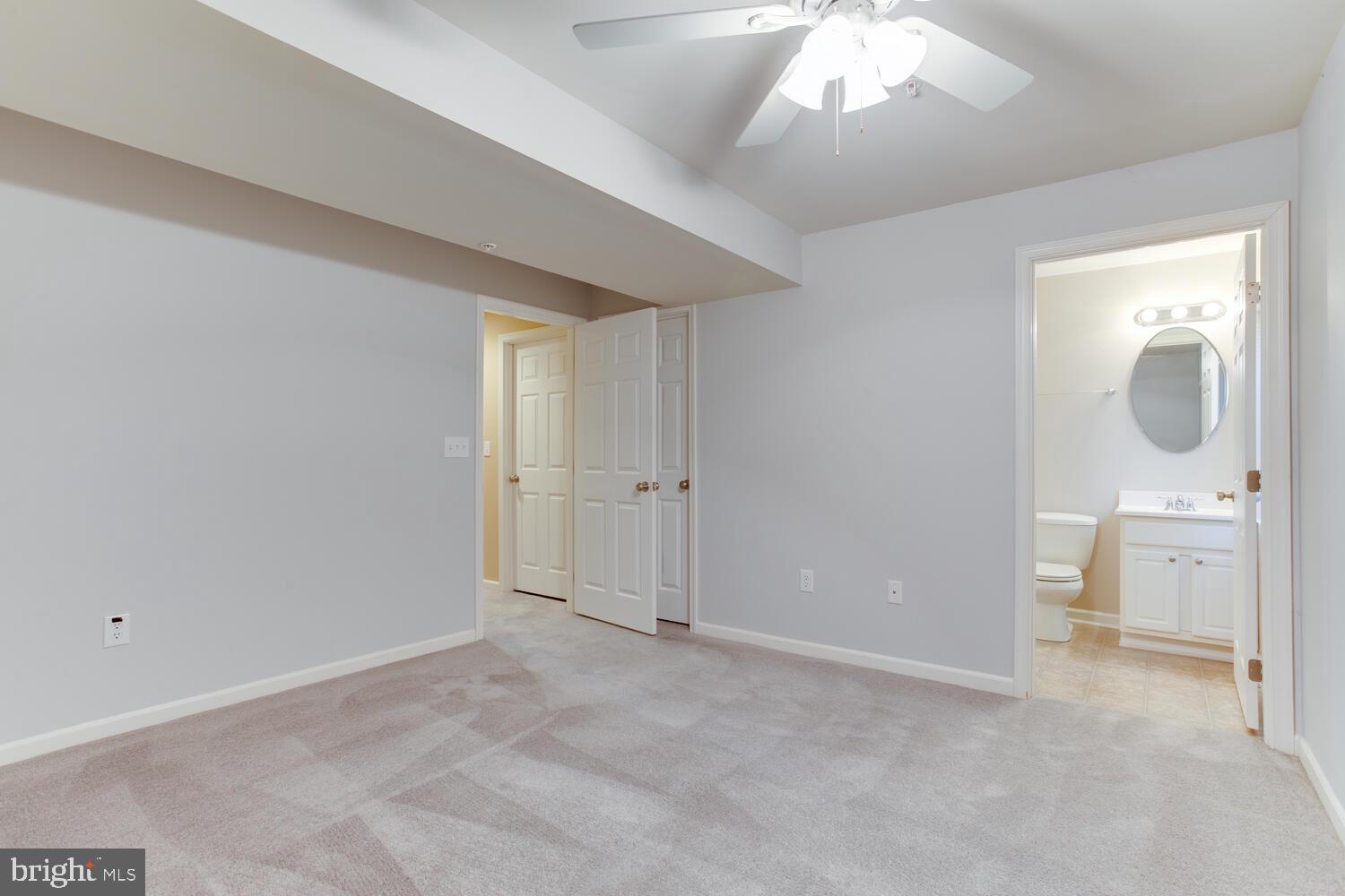 2303 Forest Ridge Terrace, Unit E Chesapeake Beach, MD 20732 - Photo 10 of 73 Main level bedroom