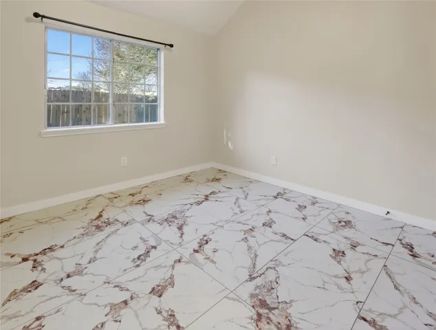 an empty room with a window