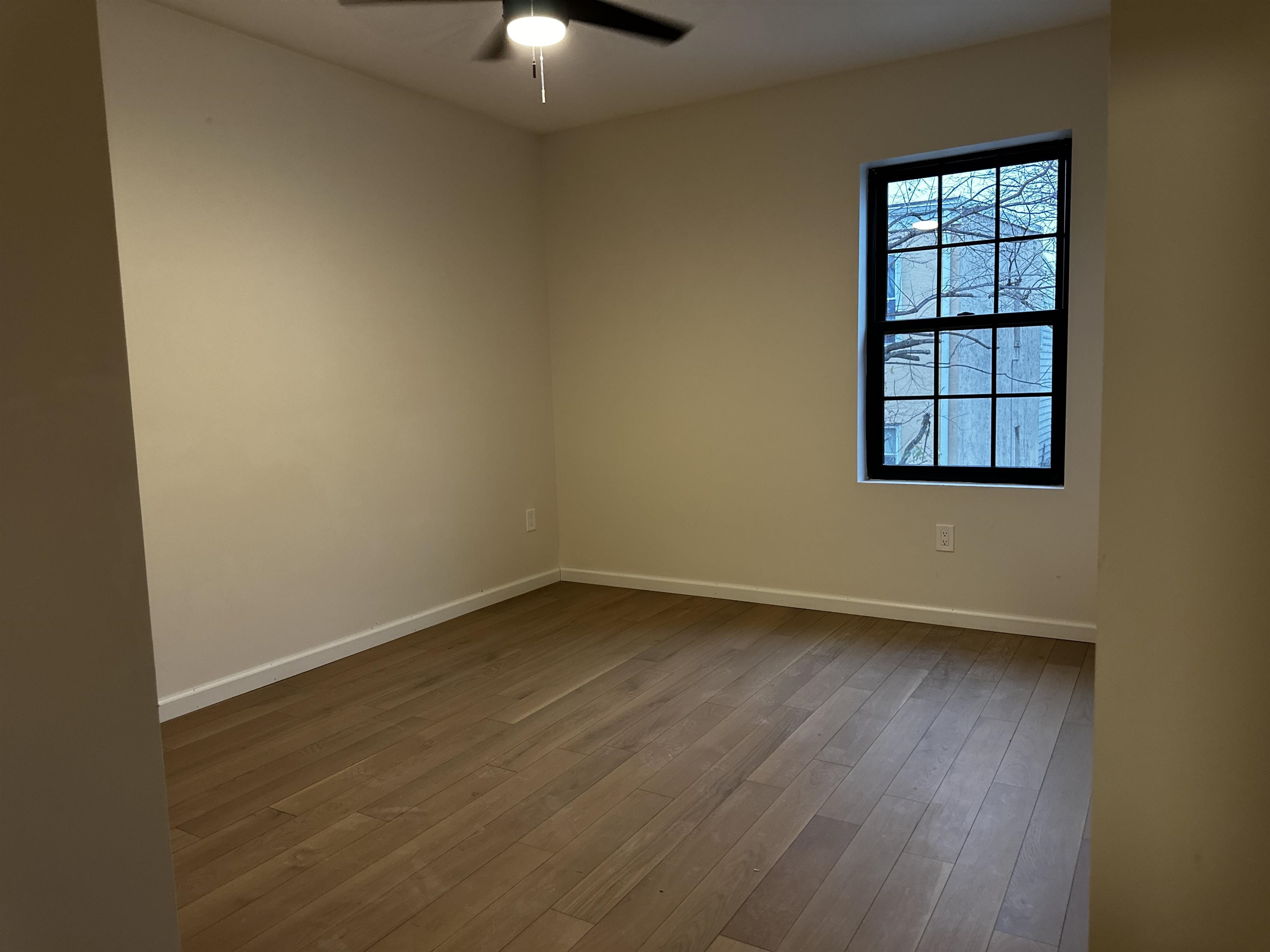 188 Heckel Street, Unit 1 Belleville, NJ 07109 - Photo 6 of 13 an empty room with a window