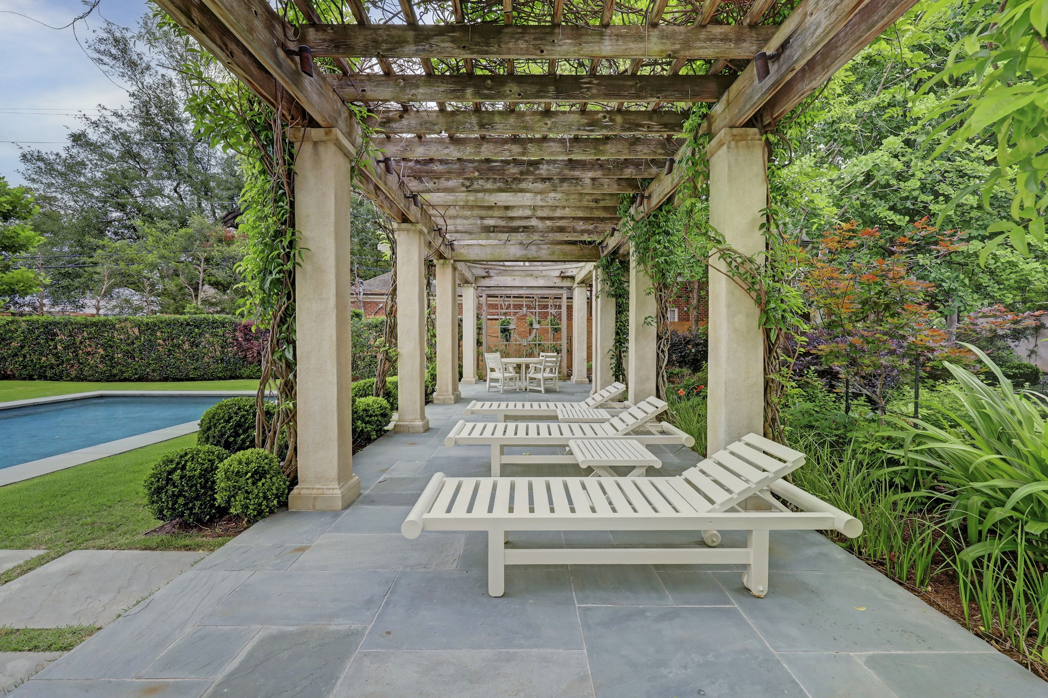 3 Briarwood Court Houston, TX 77019 - Photo 16 of 50 The Pergola overlooks the pool, fountain and backyard.