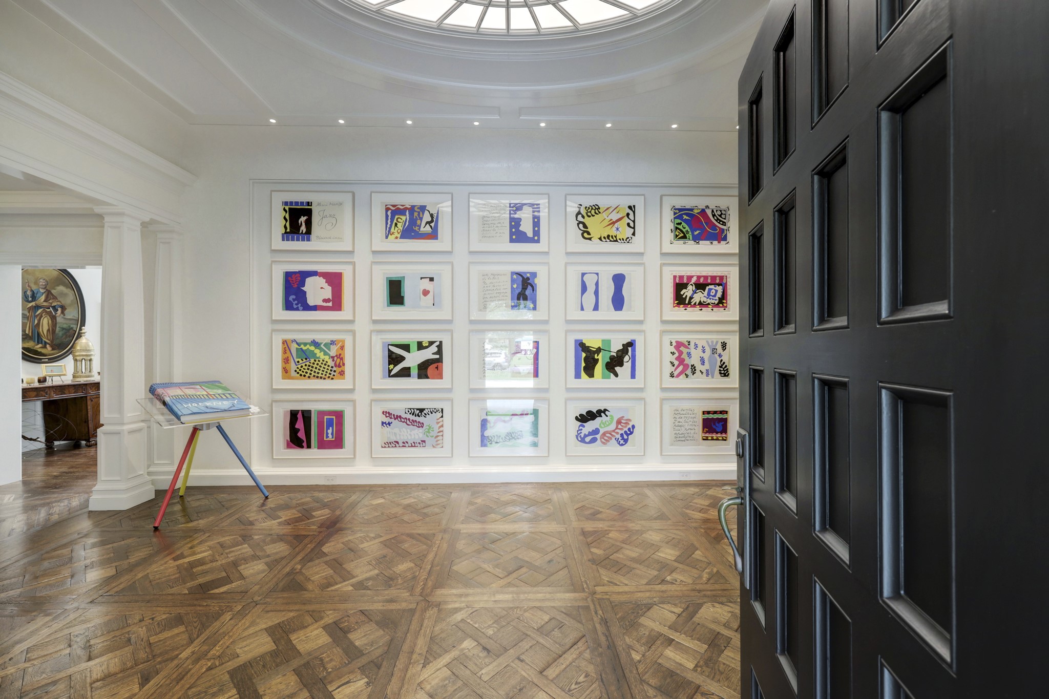3 Briarwood Court Houston, TX 77019 - Photo 3 of 50 Looking into the foyer at the entry with patterned hardwood flooring by Schenck & Company.