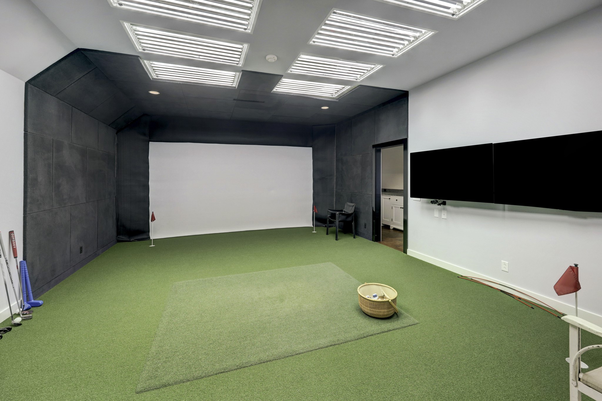 3 Briarwood Court Houston, TX 77019 - Photo 43 of 50 The Trackman Golf Simulation Room. Danish sport technology using Doplar radar tracks ball flight and club data.