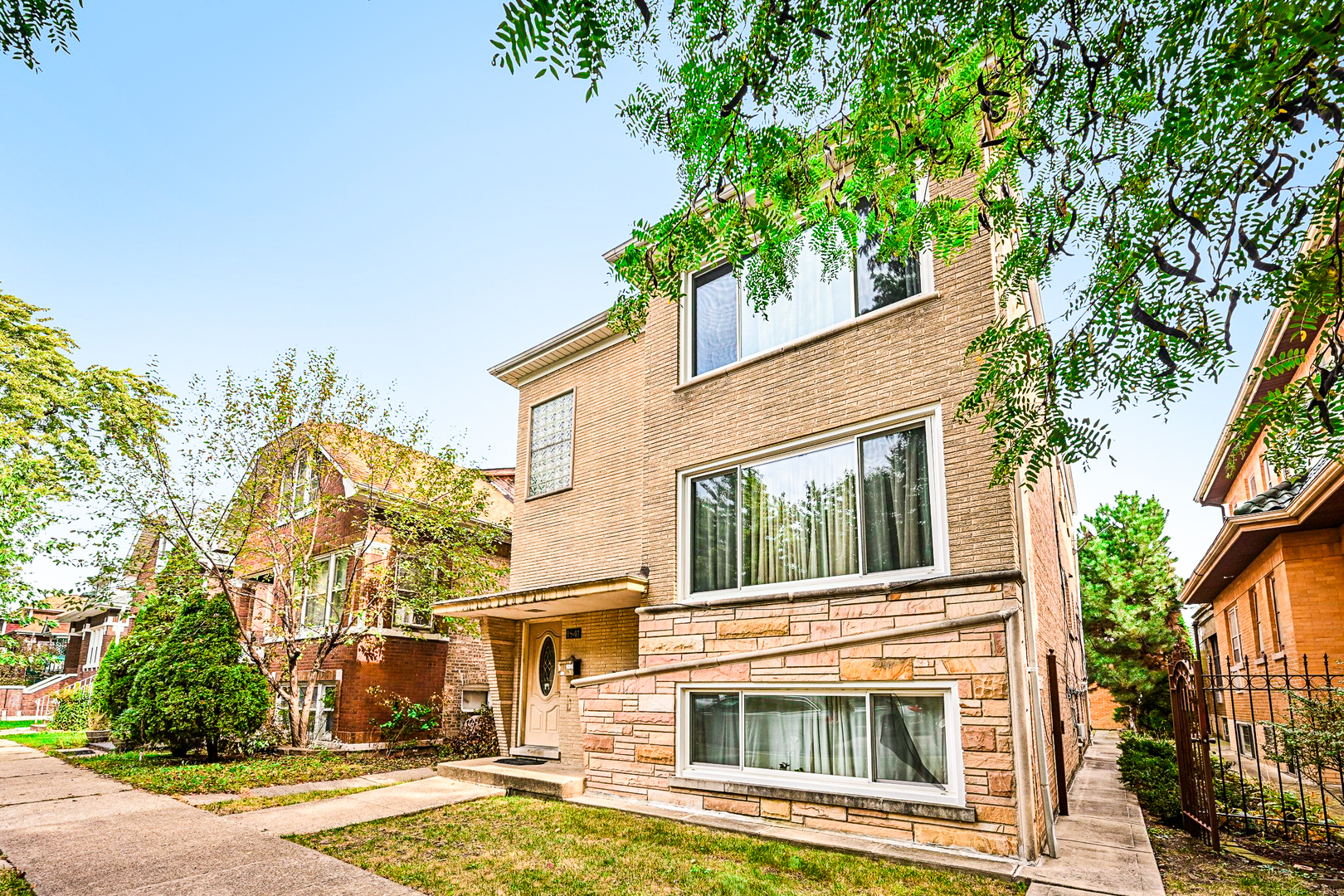 1841 South 61st Court Cicero, IL 60804 - Photo 2 of 46 a view of a house with a yard