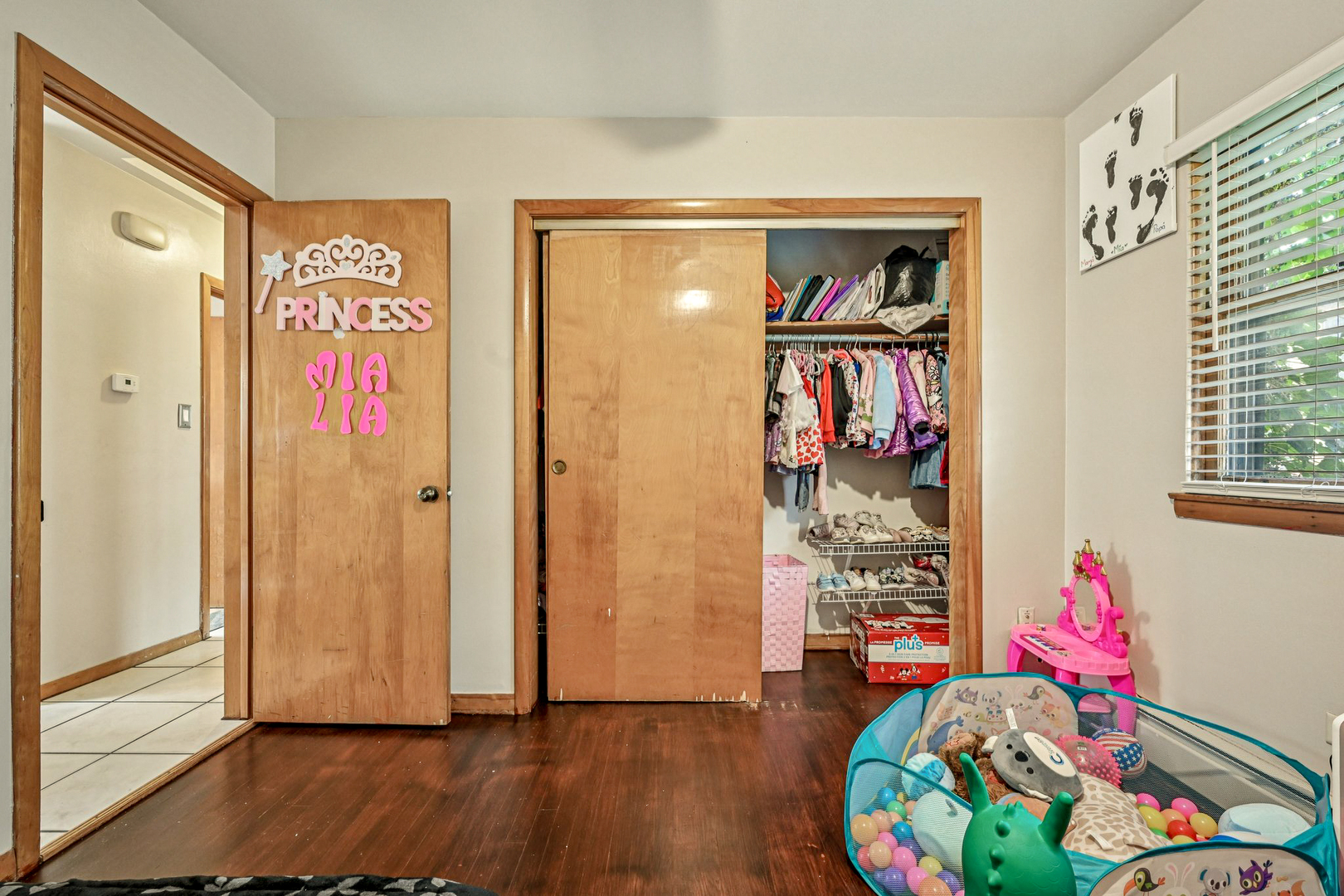 1841 South 61st Court Cicero, IL 60804 - Photo 21 of 46 a view of a hallway with wooden floor and closet