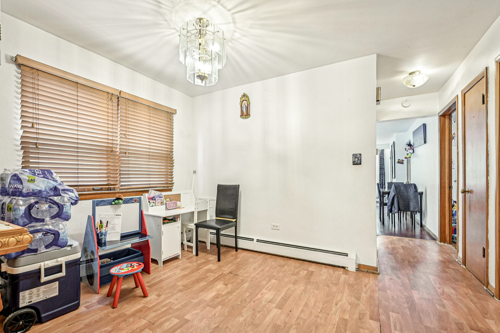 1841 South 61st Court Cicero, IL 60804 - Photo 28 of 46 a view of a livingroom with workspace and a window