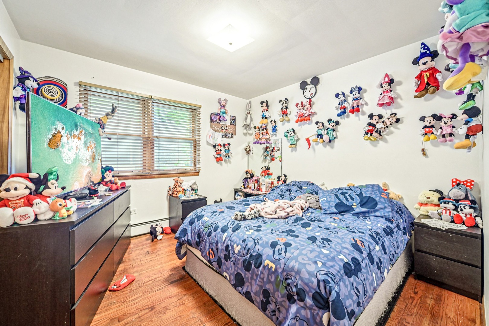 1841 South 61st Court Cicero, IL 60804 - Photo 29 of 46 a bed room with a bed and a couch