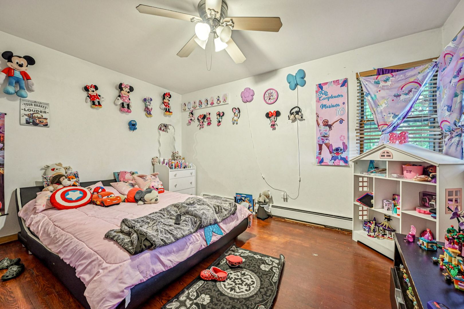 1841 South 61st Court Cicero, IL 60804 - Photo 32 of 46 a bedroom with baby bed and a window