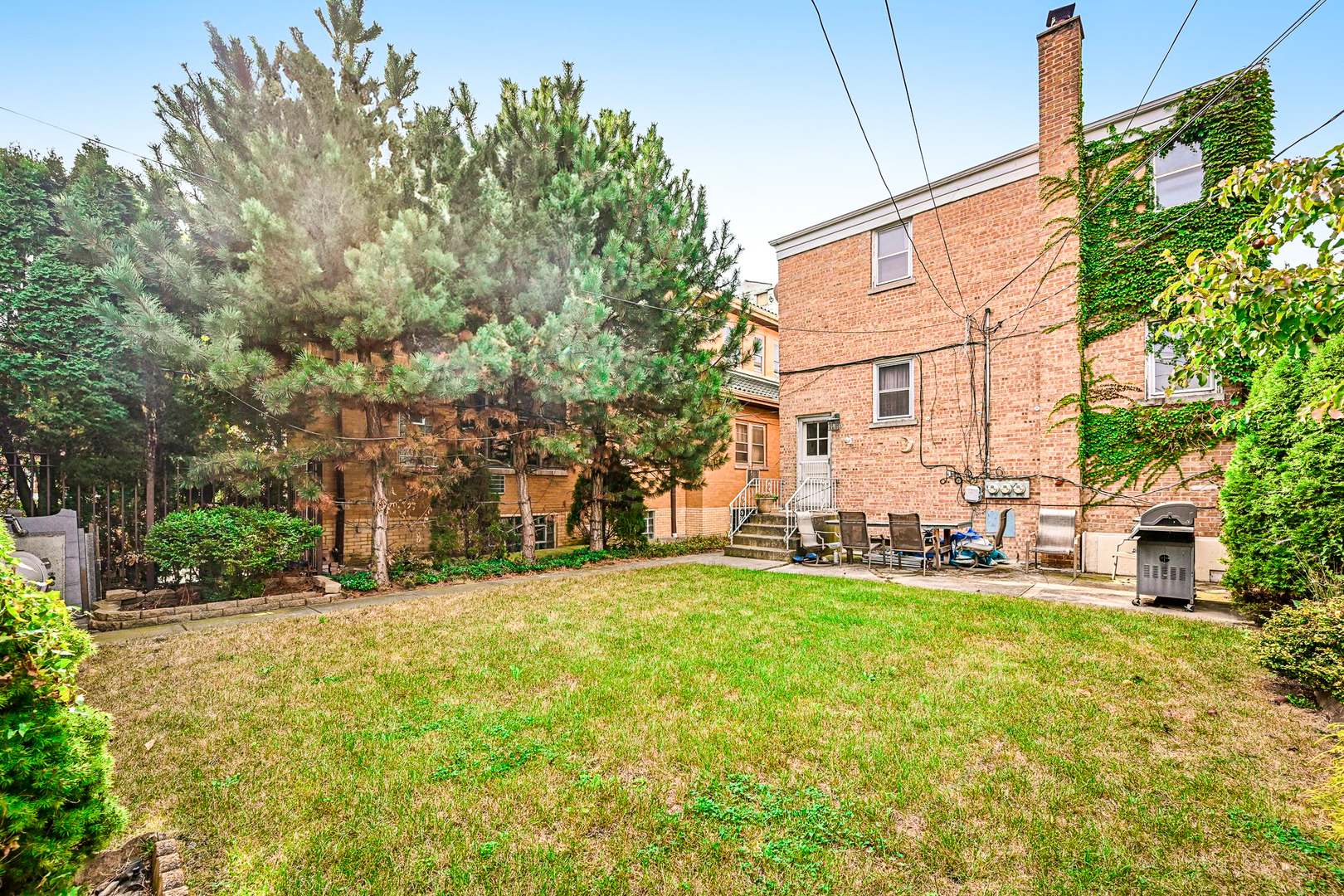 1841 South 61st Court Cicero, IL 60804 - Photo 40 of 46 a view of a building with a yard