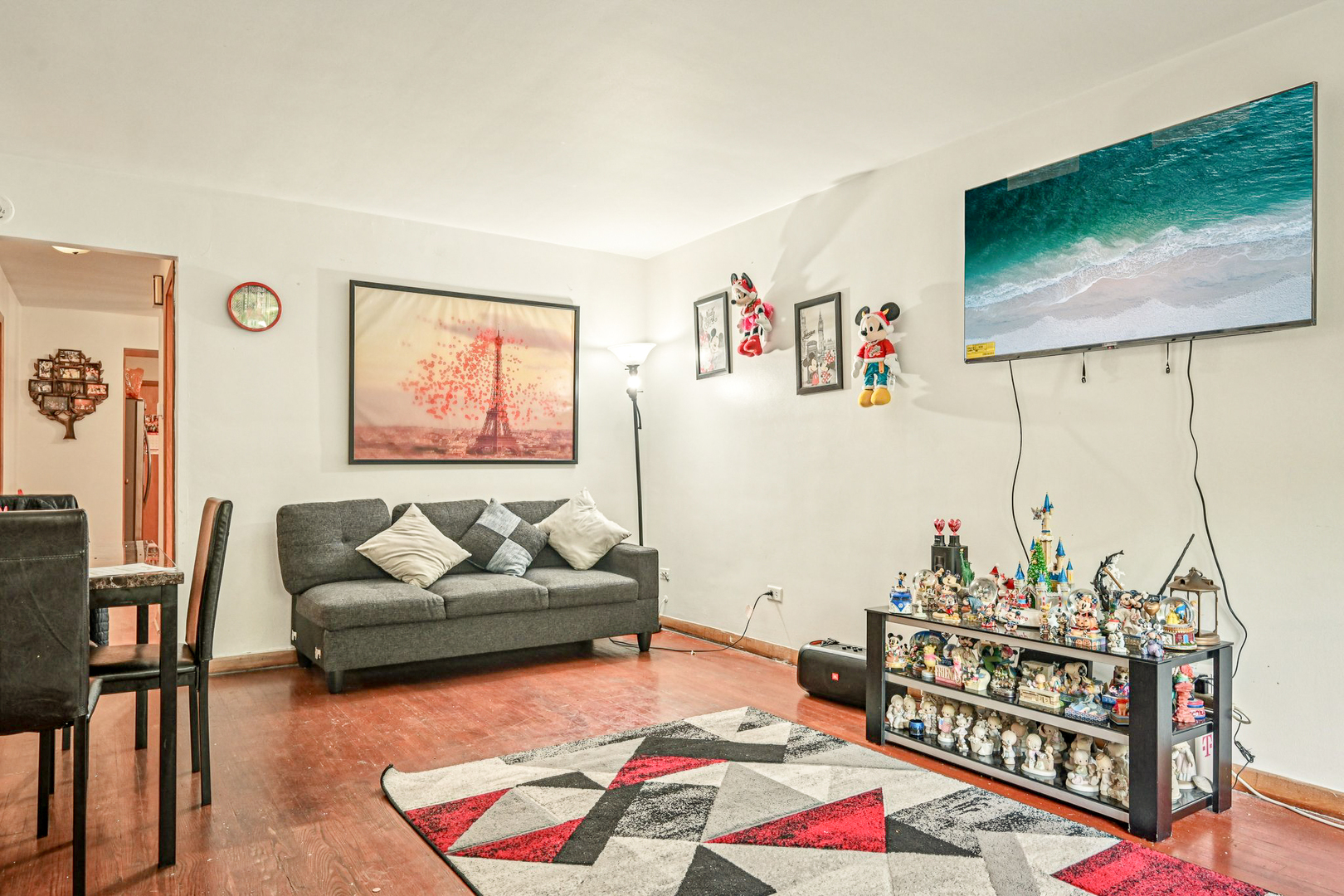 1841 South 61st Court Cicero, IL 60804 - Photo 4 of 46 a living room with furniture and a flat screen tv
