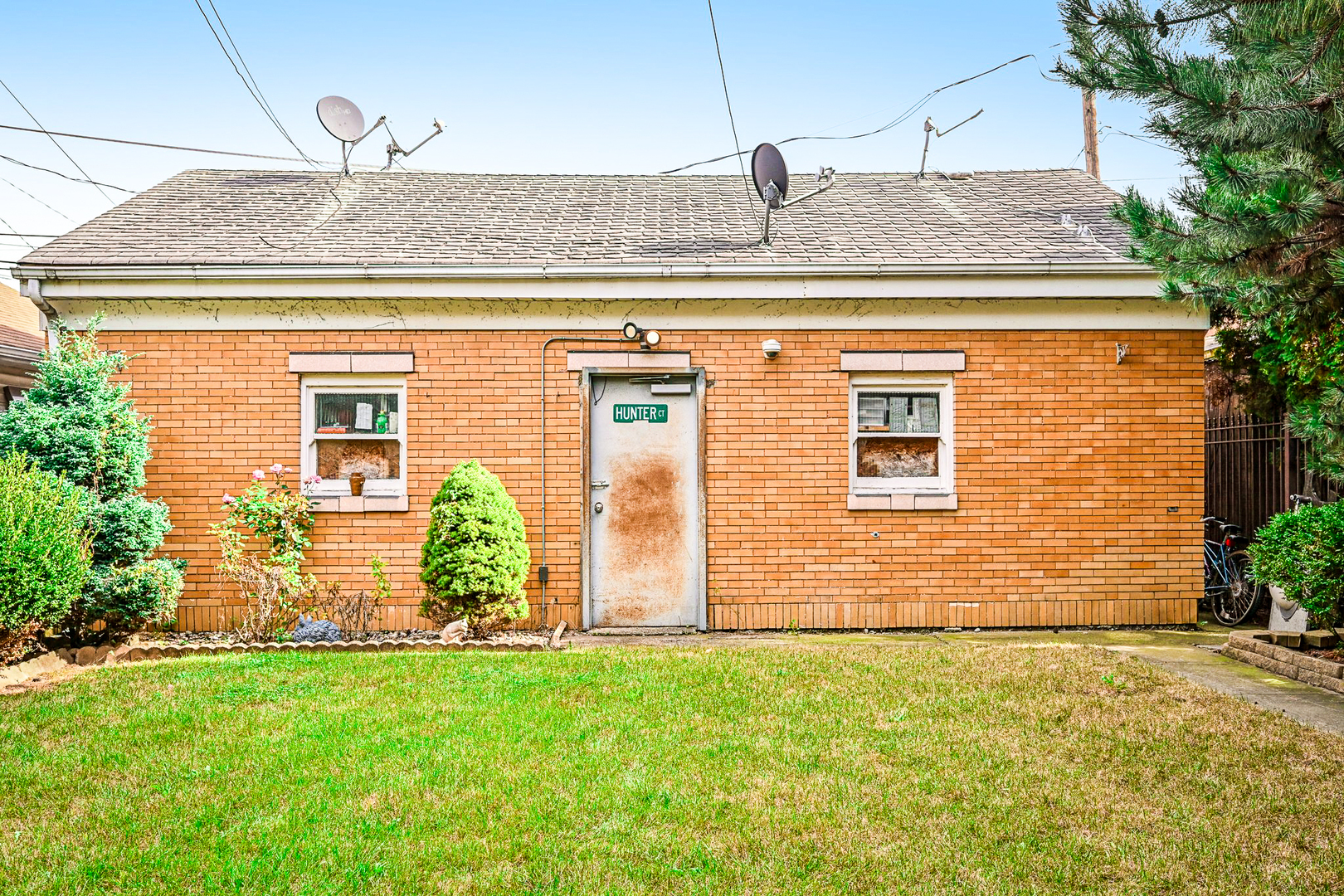 1841 South 61st Court Cicero, IL 60804 - Photo 42 of 46 a front view of a house with garden