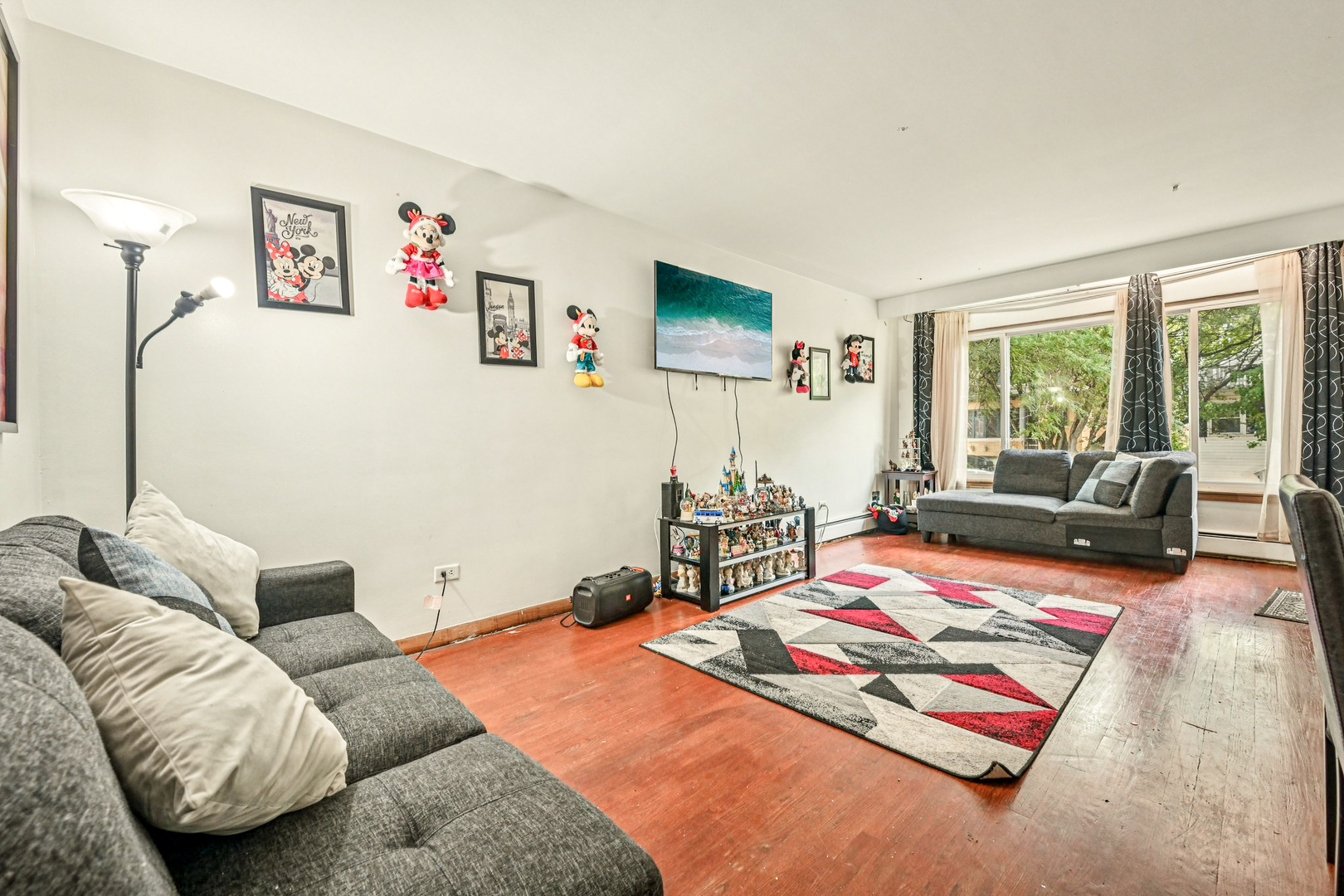 1841 South 61st Court Cicero, IL 60804 - Photo 5 of 46 a living room with furniture rug and window