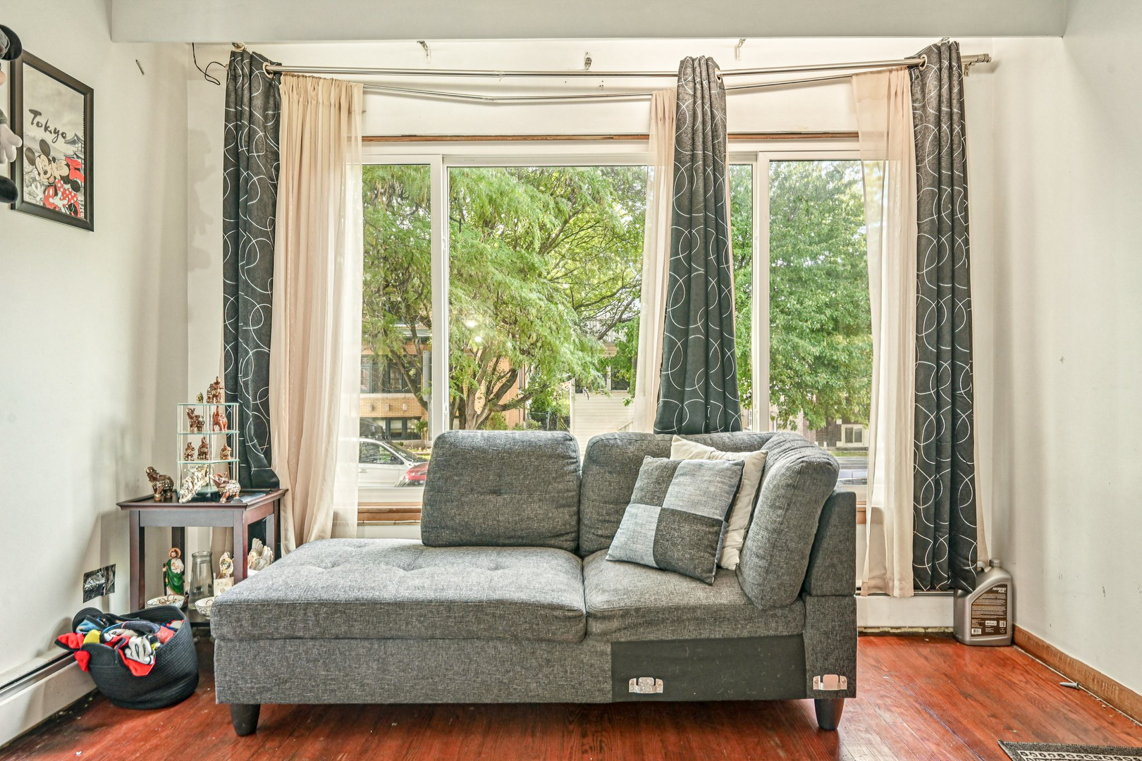 1841 South 61st Court Cicero, IL 60804 - Photo 7 of 46 a bedroom with a bed and wooden floor