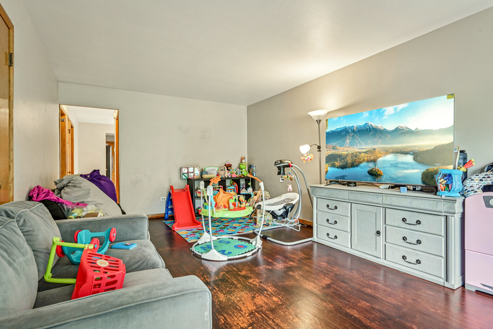 1841 South 61st Court Cicero, IL 60804 - Photo 8 of 46 a living room with furniture and wooden floor