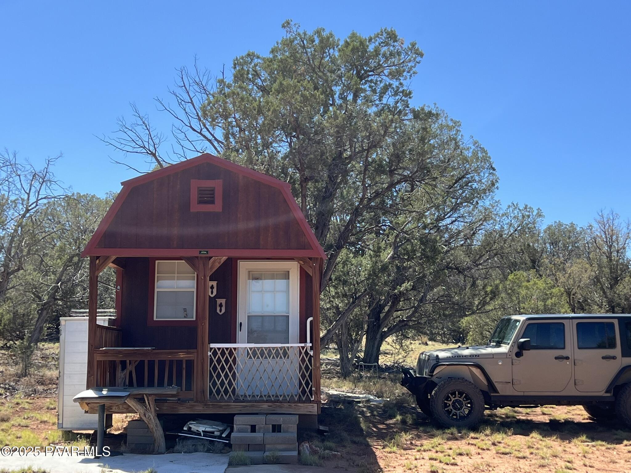 224 E2 Rocky Road Ash Fork, AZ 86320 - Photo 4 of 9 a view of a house with a roof deck
