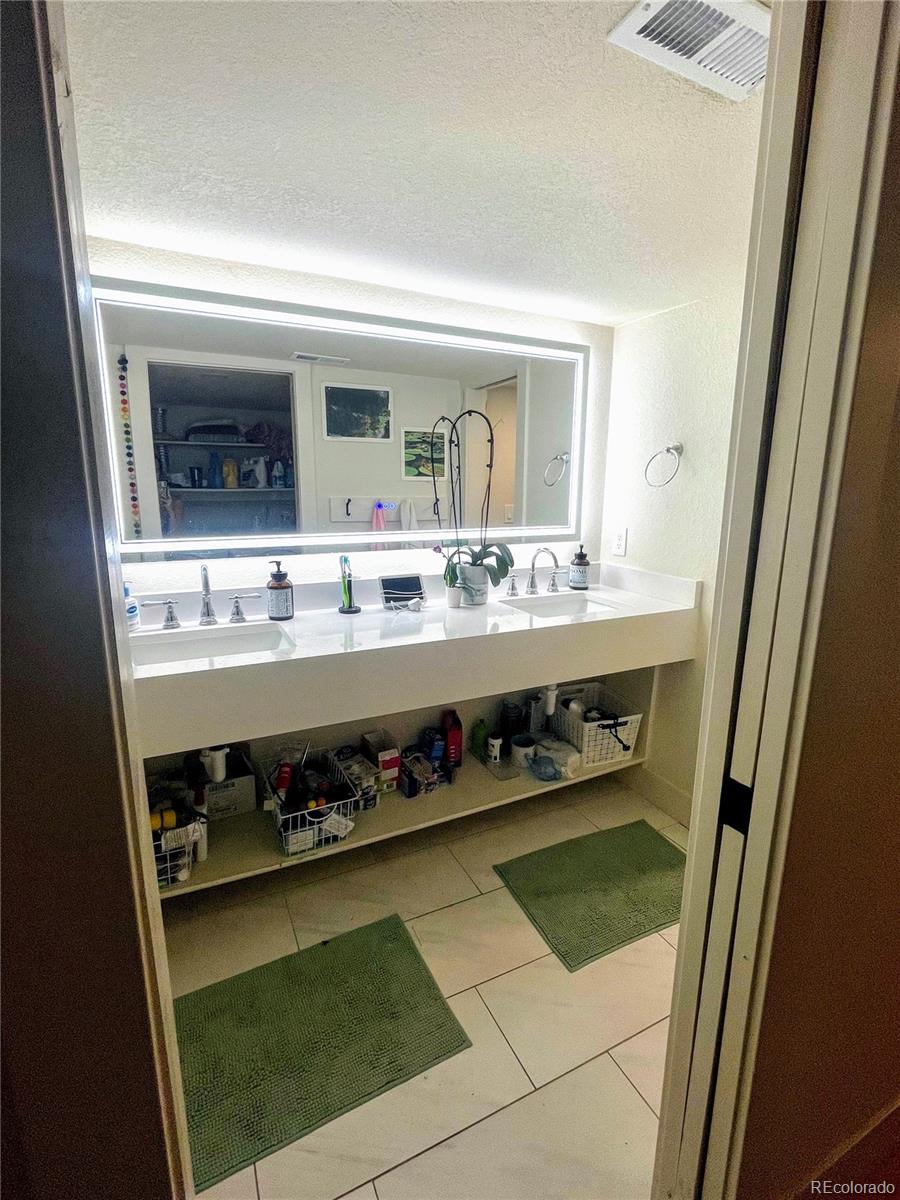 1069 11th Street Boulder, CO 80302 - Photo 13 of 28 a utility room with washer and dryer