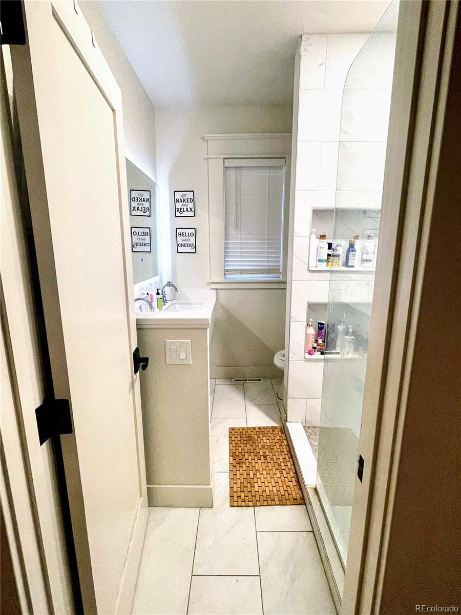 1069 11th Street Boulder, CO 80302 - Photo 15 of 28 a room with storage and utility