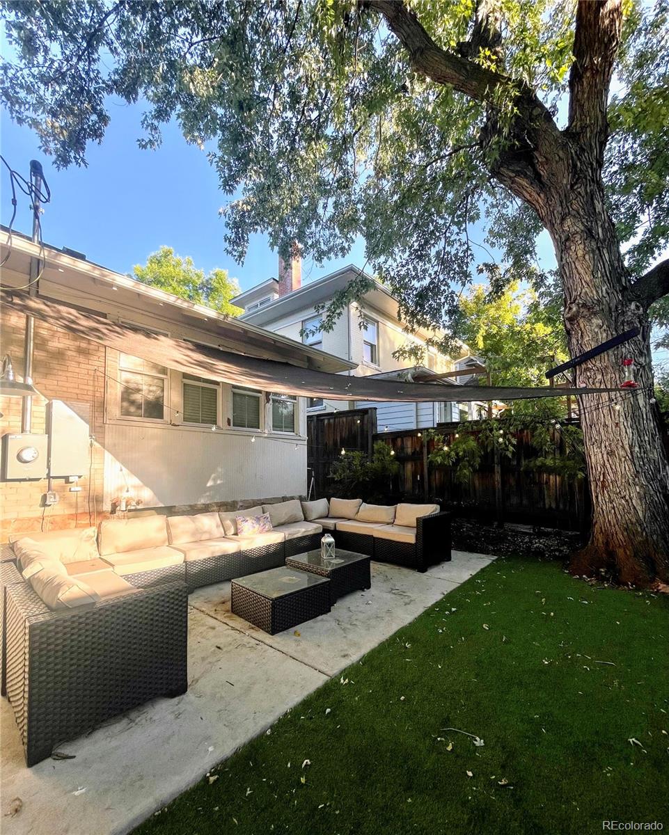 1069 11th Street Boulder, CO 80302 - Photo 19 of 28 a view of a house with backyard and sitting area