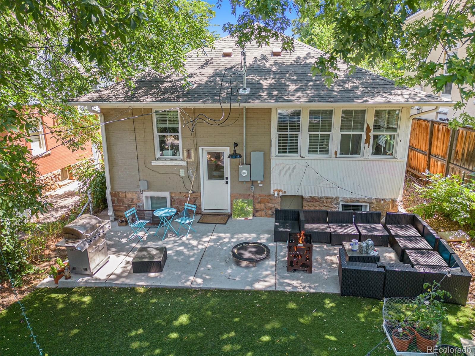 1069 11th Street Boulder, CO 80302 - Photo 2 of 28 a view of house with backyard and patio