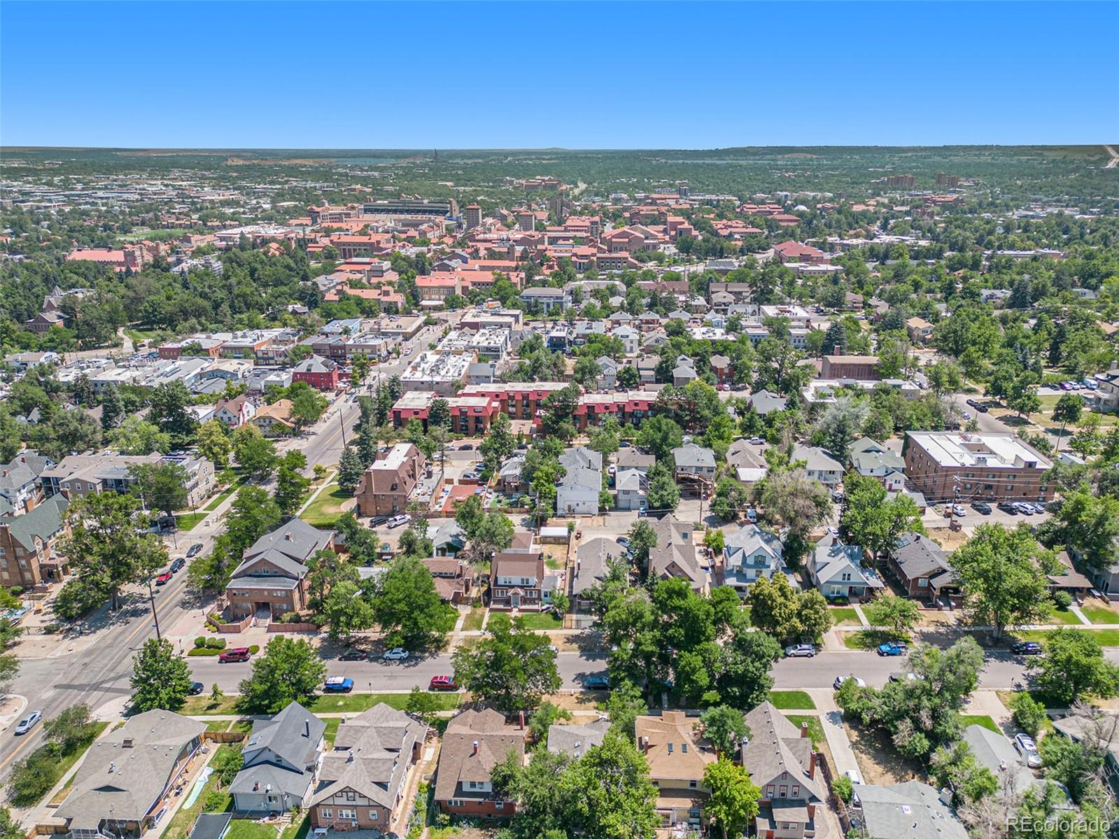 1069 11th Street Boulder, CO 80302 - Photo 21 of 28 an aerial view of residential houses with outdoor space and trees