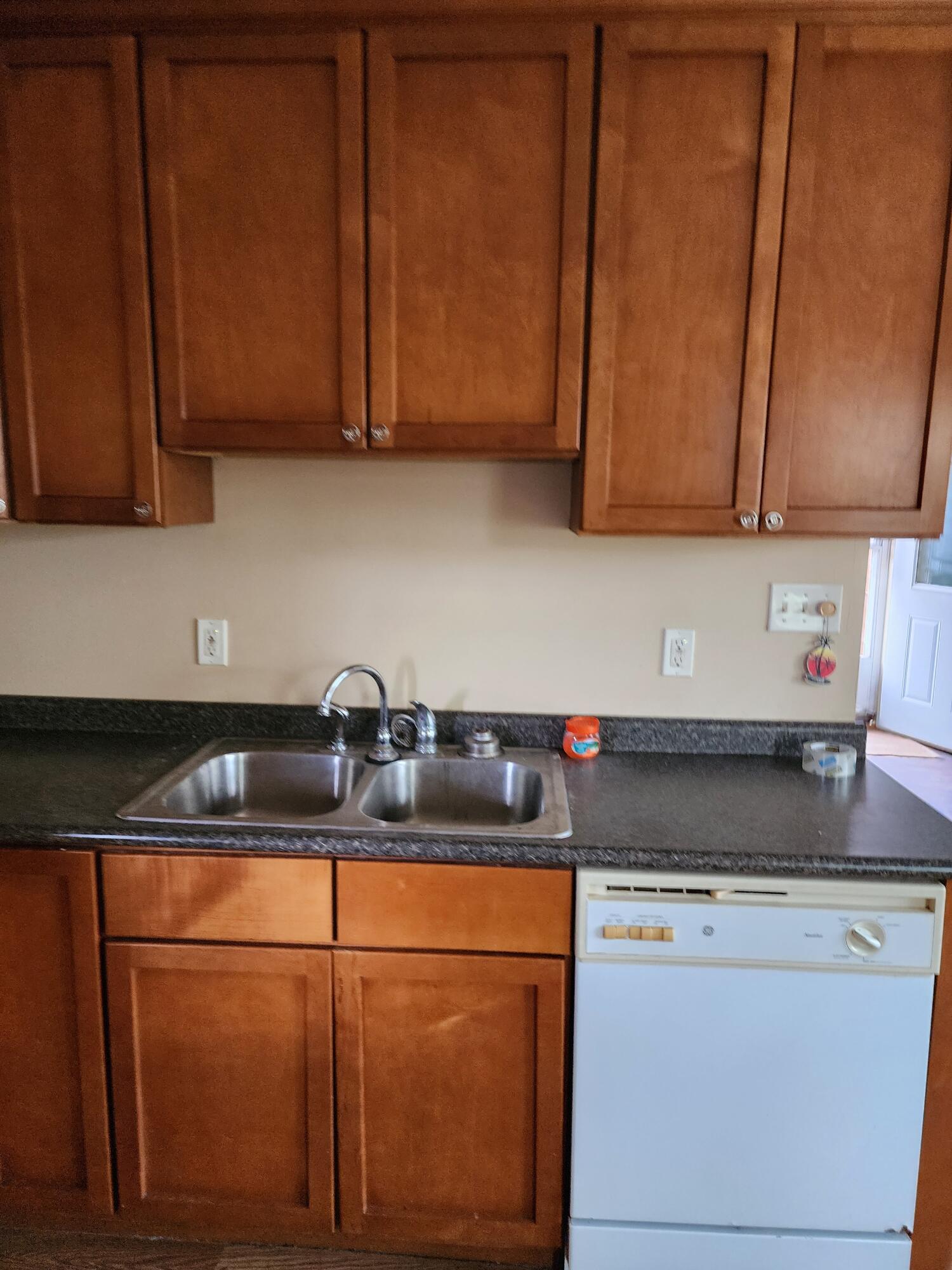 2965 Bunkum Road Rensselaer, IN 47978 - Photo 23 of 39 a kitchen with stainless steel appliances granite countertop wooden cabinets a stove a sink and dishwasher