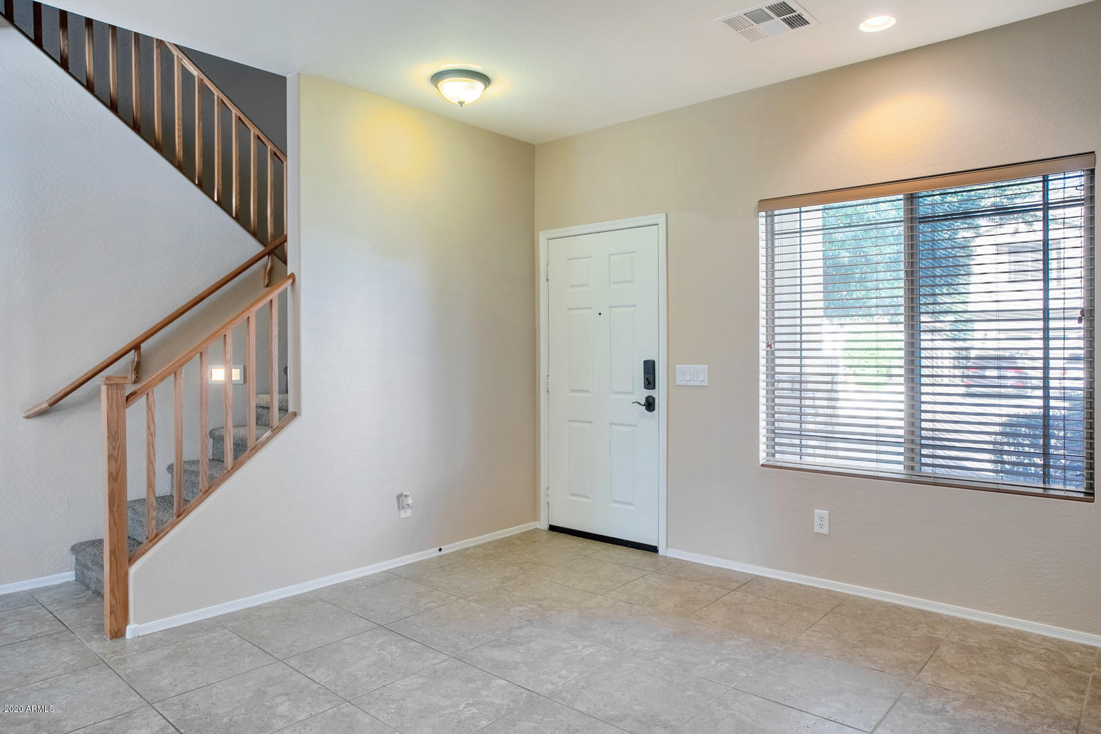 401 South 166th Drive Goodyear, AZ 85338 - Photo 2 of 33 a view of an entryway with a livingroom