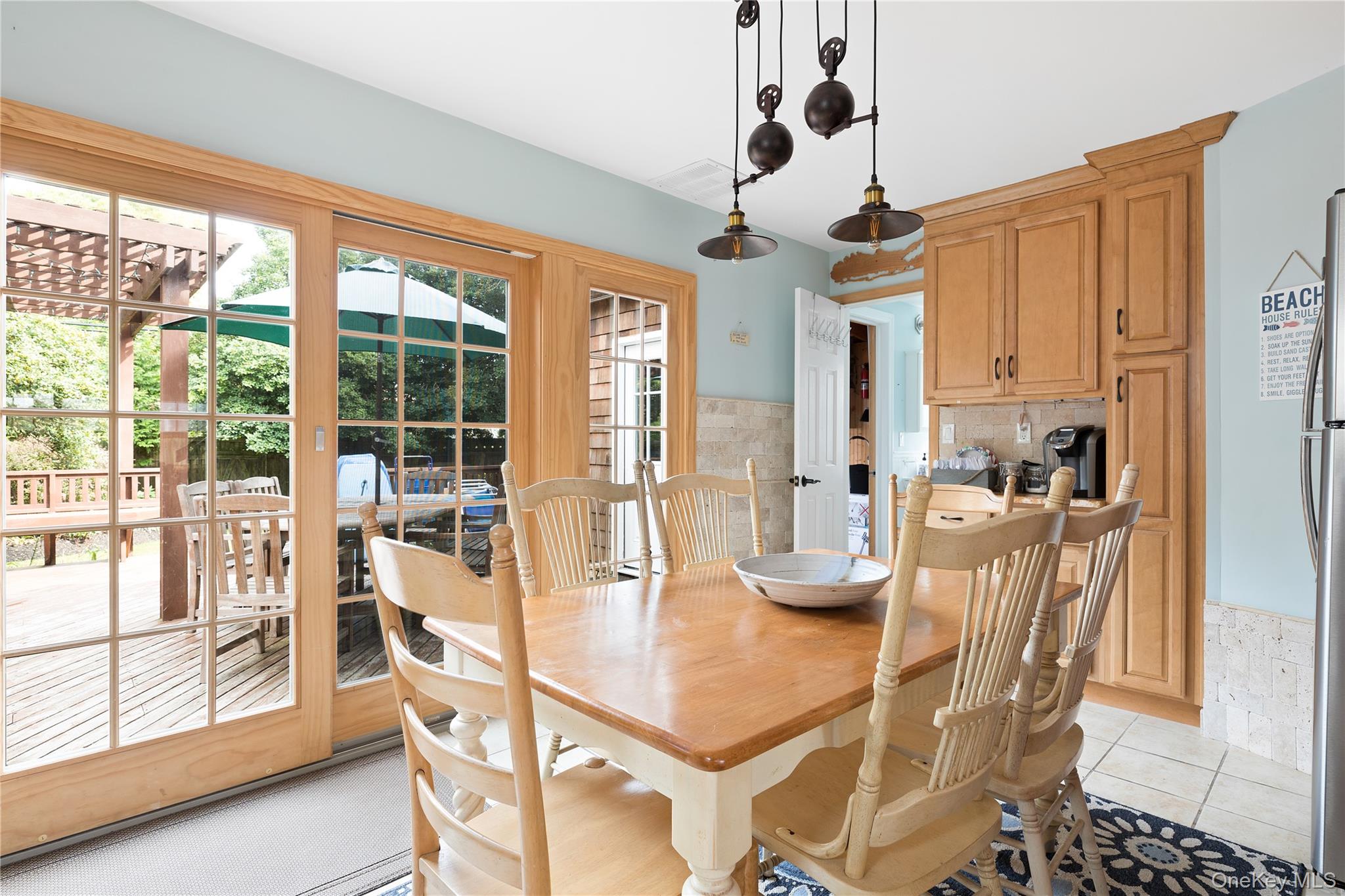 19 Ocean Road Ocean Beach, NY 11770 - Photo 4 of 20 Dining room featuring light tile patterned floors