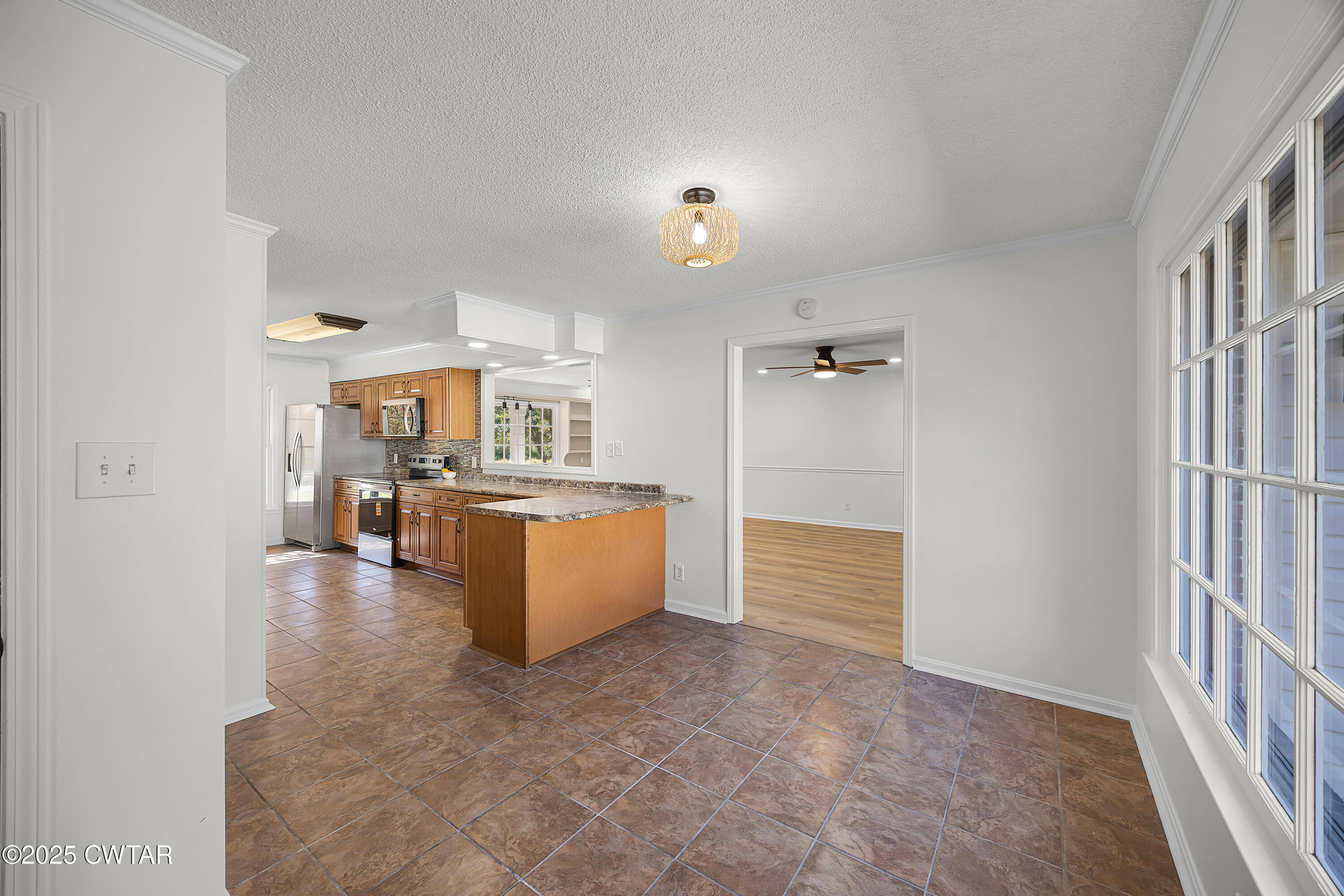 247 Highway 412 Jackson, TN 38305 - Photo 14 of 29 a view of a kitchen and kitchen with furniture