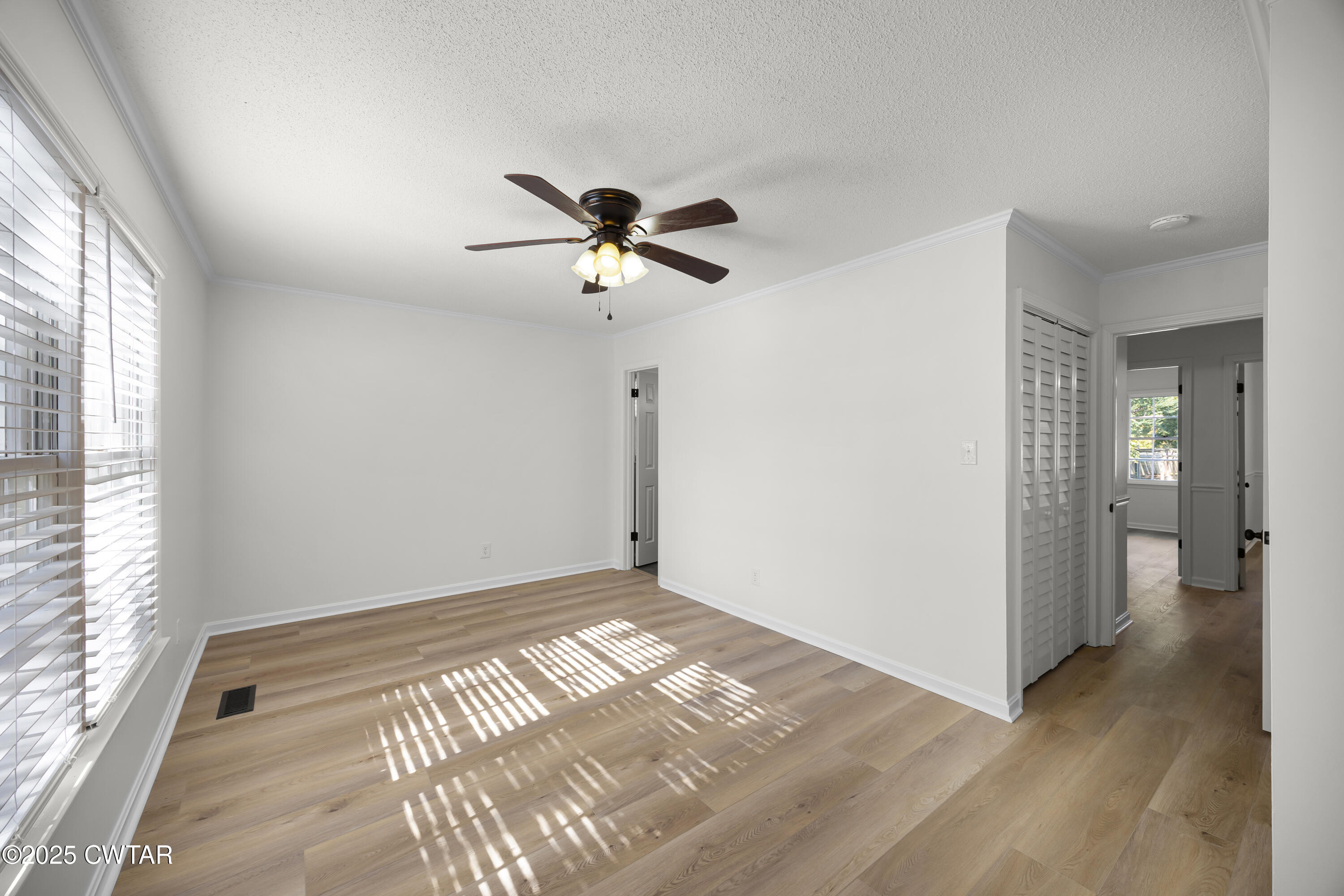 247 Highway 412 Jackson, TN 38305 - Photo 19 of 29 a view of room with a ceiling fan and window