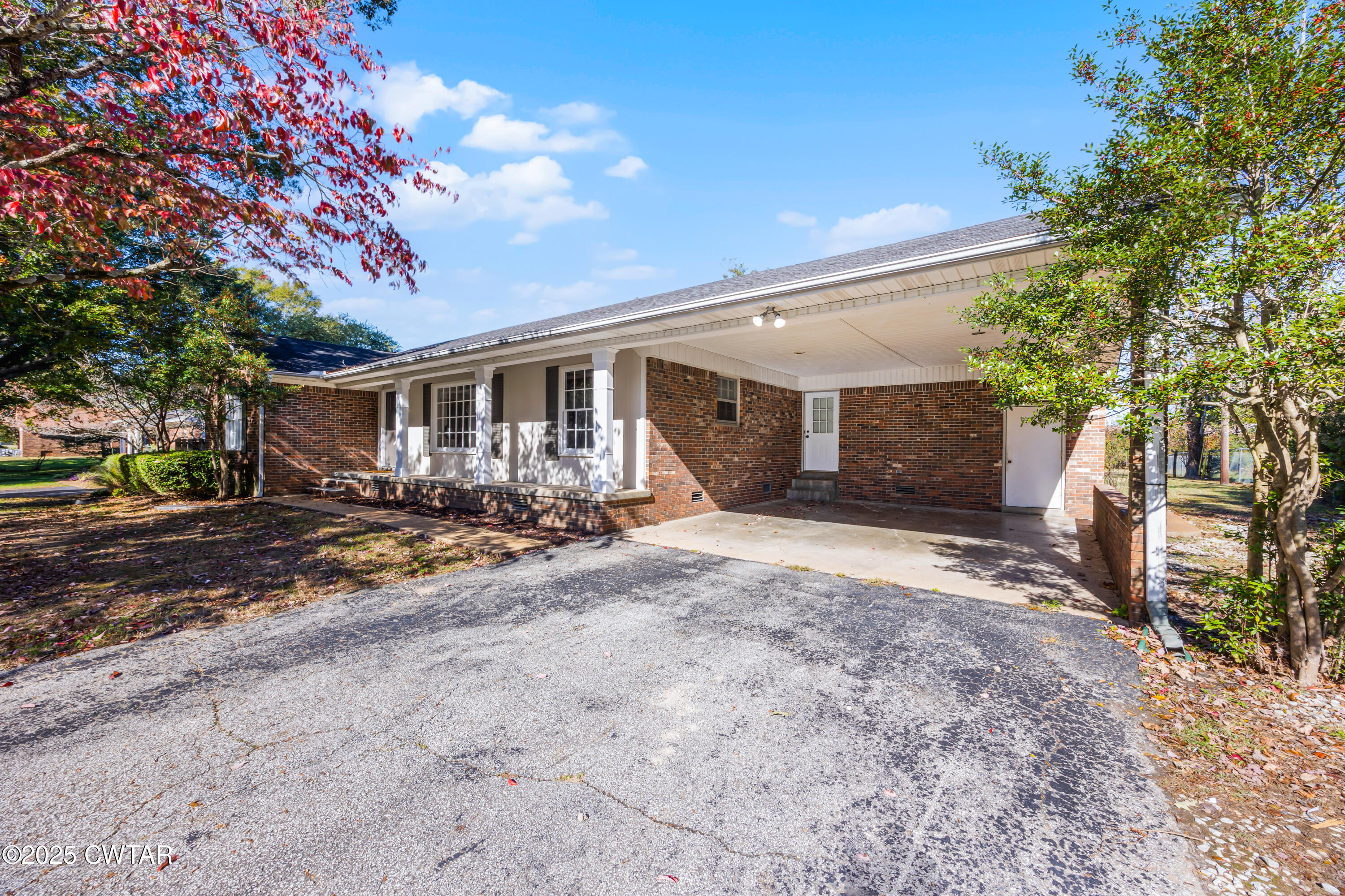 247 Highway 412 Jackson, TN 38305 - Photo 2 of 29 a view of a house with backyard and sitting area