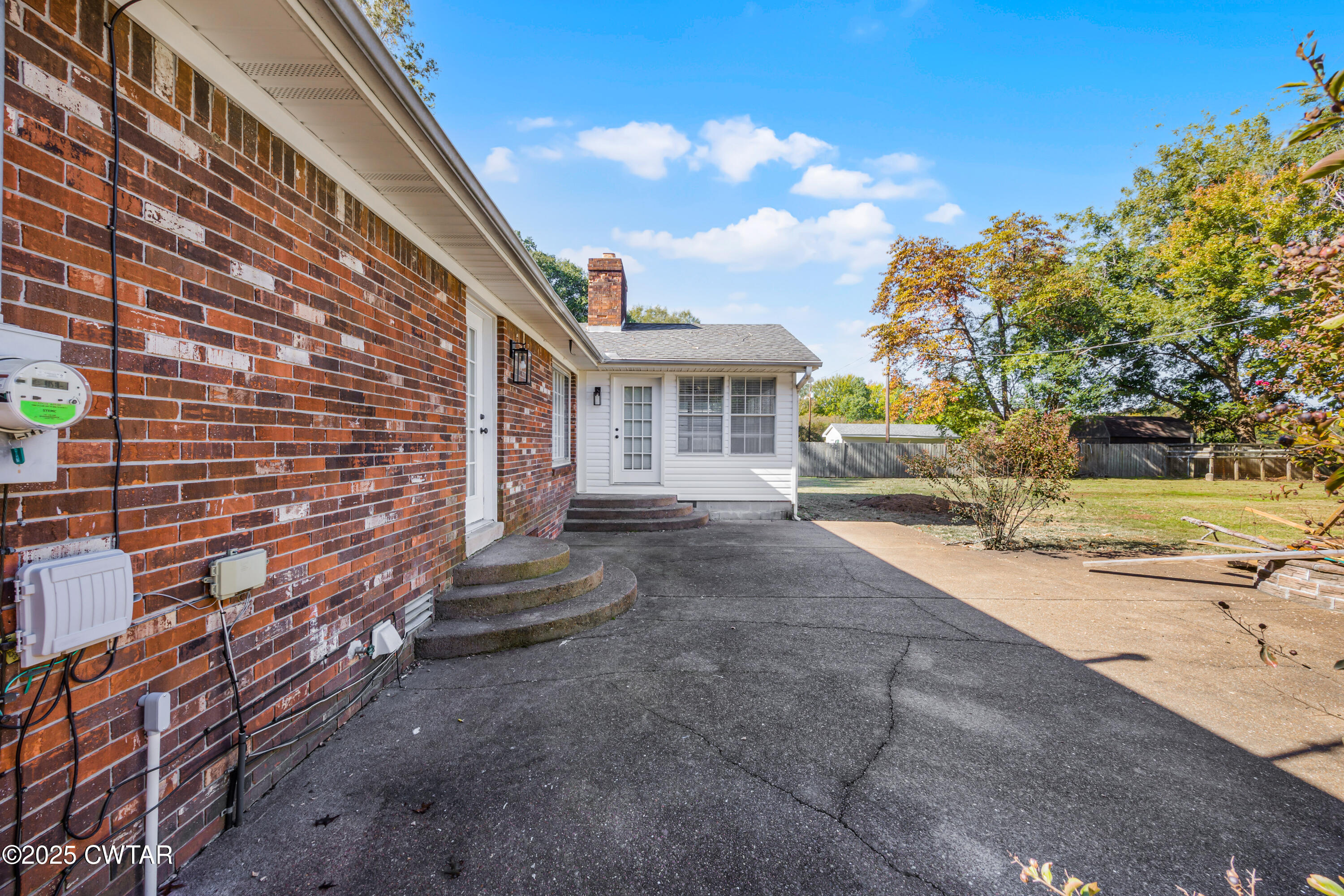 247 Highway 412 Jackson, TN 38305 - Photo 27 of 29 a front view of a house with a yard