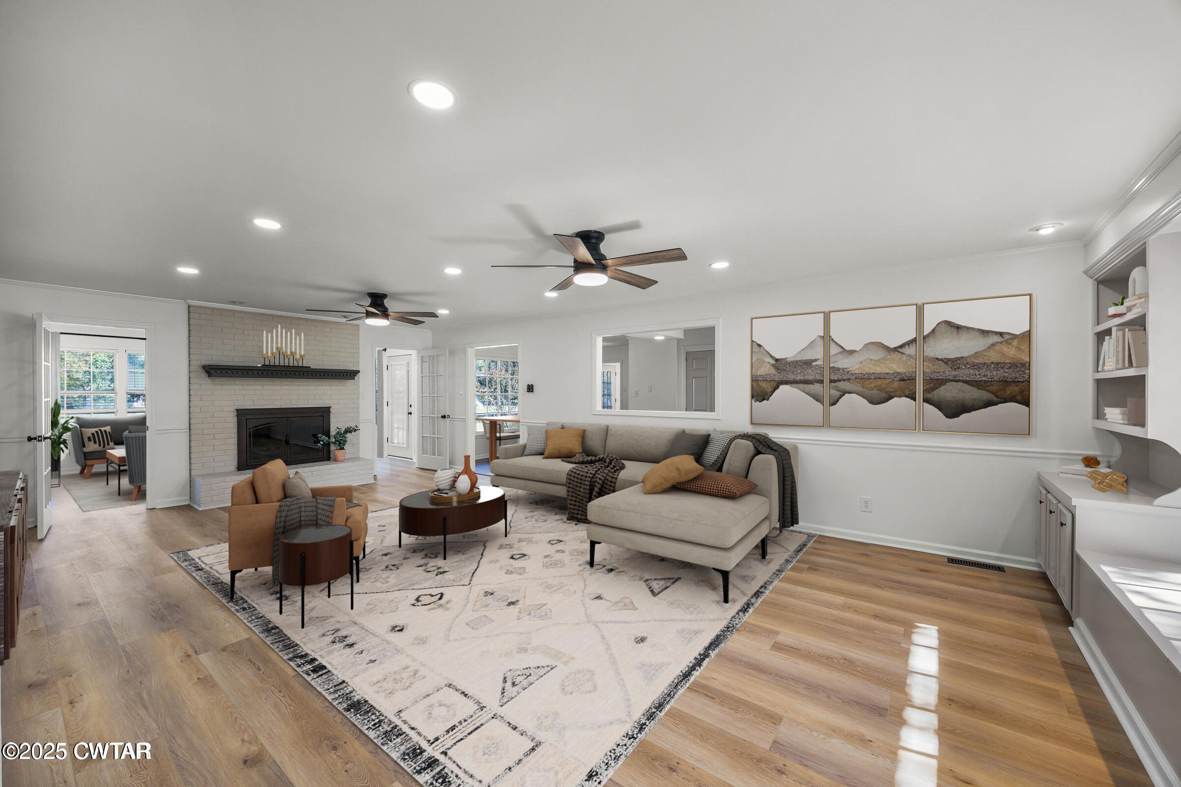 247 Highway 412 Jackson, TN 38305 - Photo 3 of 29 a living room with furniture kitchen view and a fireplace