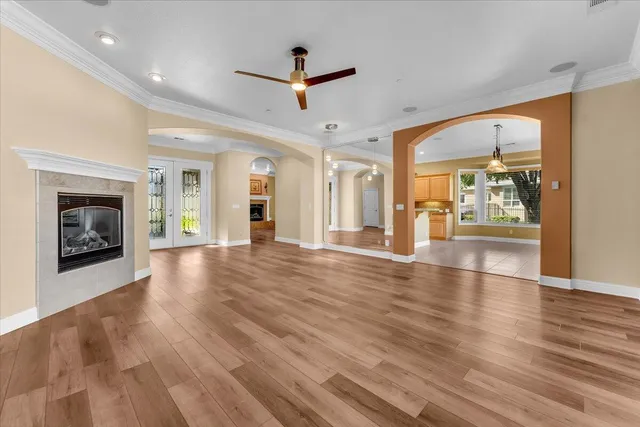 a kitchen with stainless steel appliances granite countertop a stove and a refrigerator