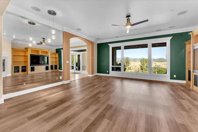 a kitchen with stainless steel appliances granite countertop a sink and cabinets