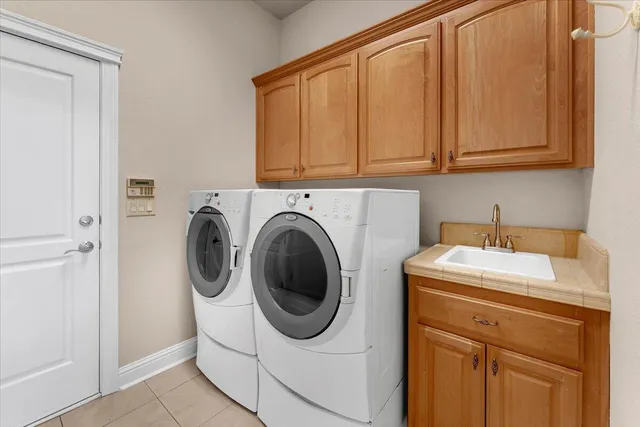 a bathroom with a sink a vanity and a mirror