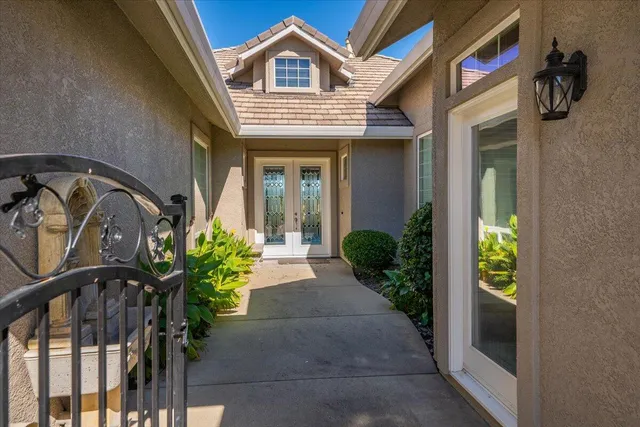 a kitchen with stainless steel appliances granite countertop a refrigerator sink and cabinets