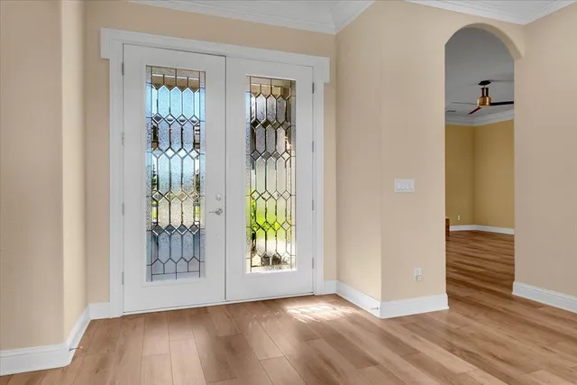a kitchen with stainless steel appliances granite countertop a stove and cabinets
