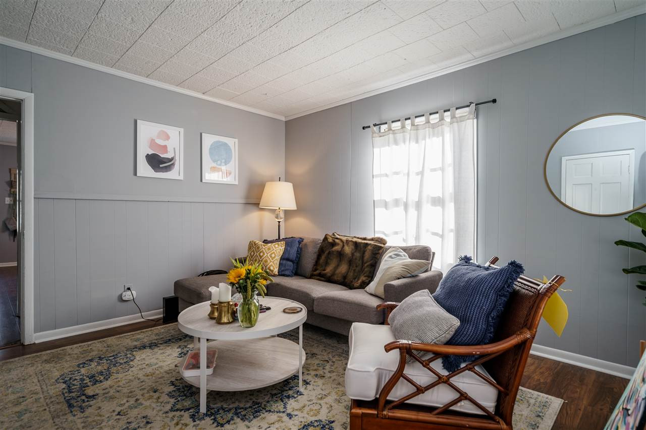 2402 Everett Avenue Raleigh, NC 27607 - Photo 3 of 20 a living room with furniture and a window