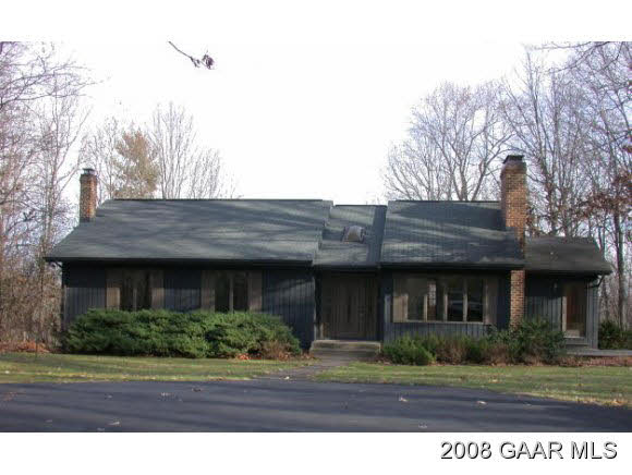 2446 Shutterlee Mill Road Staunton, VA 24401 - Photo 1 of 6 a front view of a house with a yard