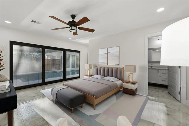 a bedroom with a bed and window