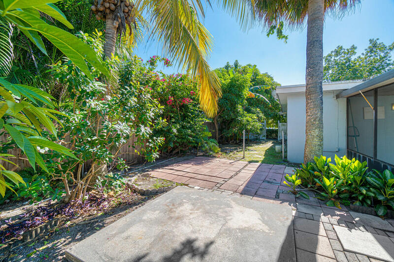 1641 Northwest 9th Street Boca Raton, FL 33486 - Photo 29 of 29 a view of a backyard with a garden