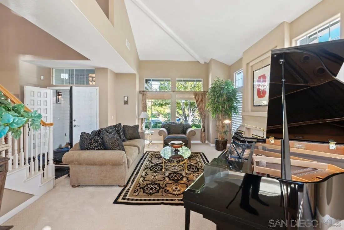 14268 Silver Ridge Road Poway, CA 92064 - Photo 11 of 53 a living room with furniture and a flat screen tv