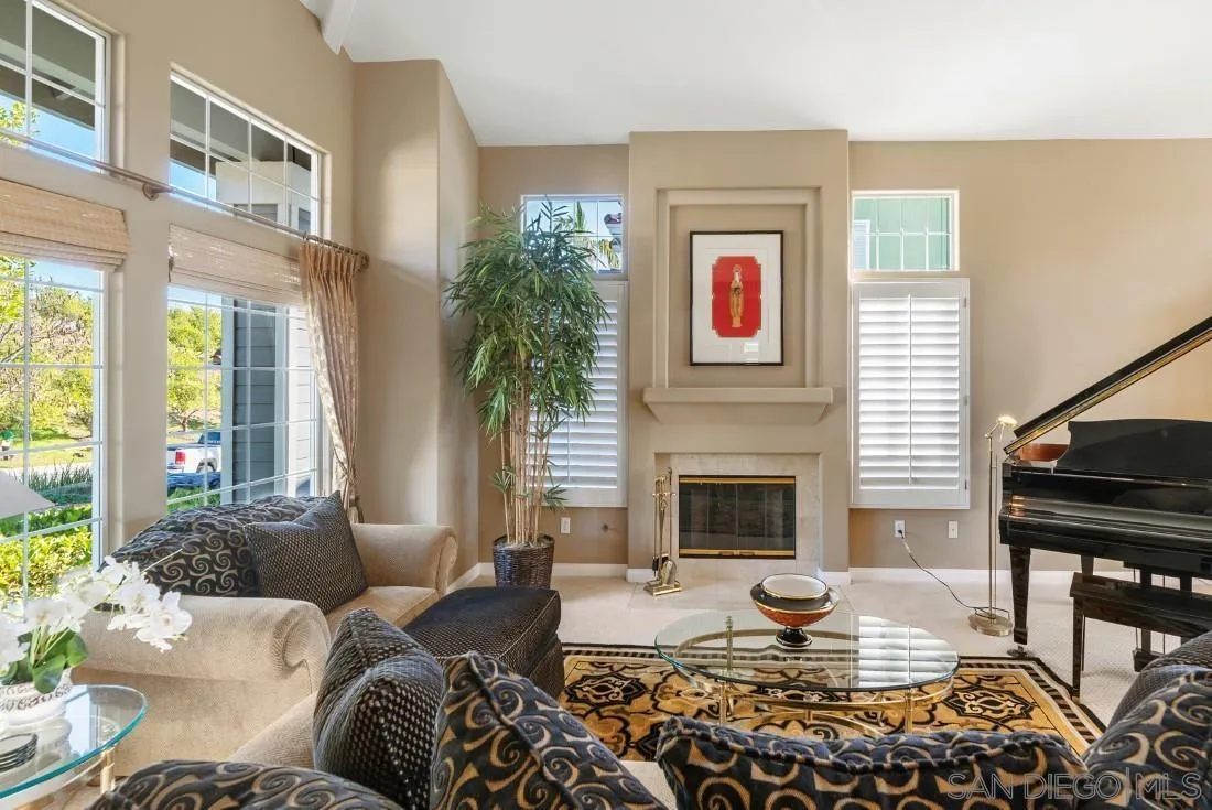 14268 Silver Ridge Road Poway, CA 92064 - Photo 3 of 53 a living room with furniture or couch and a fireplace