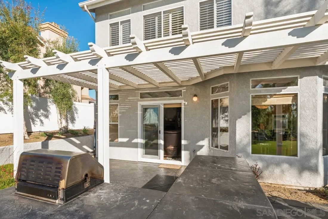 14268 Silver Ridge Road Poway, CA 92064 - Photo 35 of 53 a view of a building with a sitting area