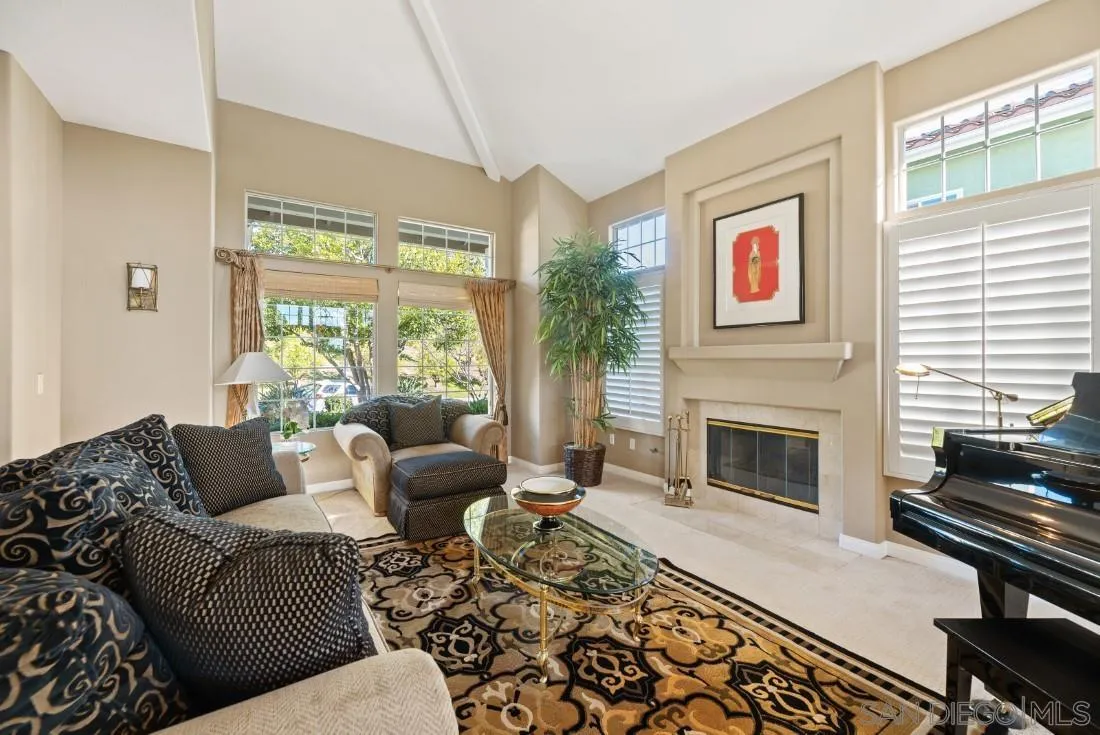 14268 Silver Ridge Road Poway, CA 92064 - Photo 4 of 53 a living room with furniture and a fireplace