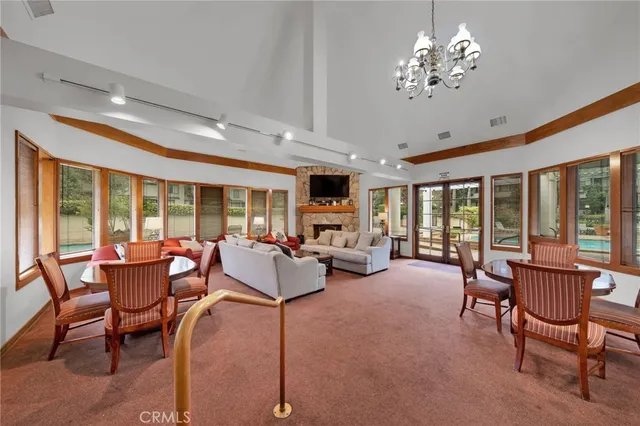a view of a livingroom with furniture window and outside view