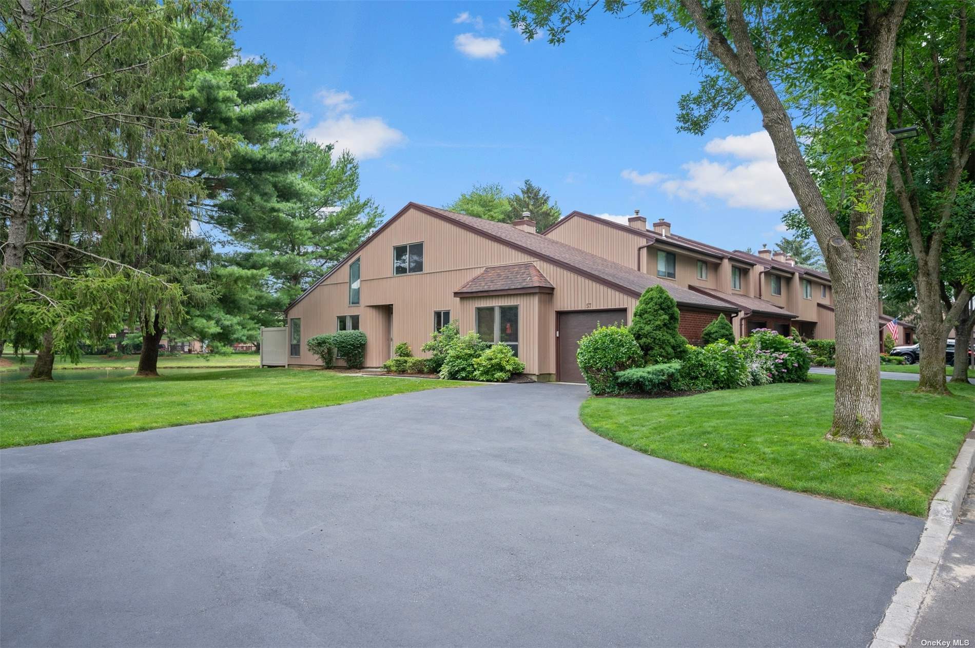 57 Timber Ridge Drive, Unit 57, Holbrook, NY 11741 Compass